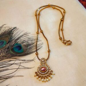 Regal Antique Gold-Plated Necklace with Red Stone Pendant