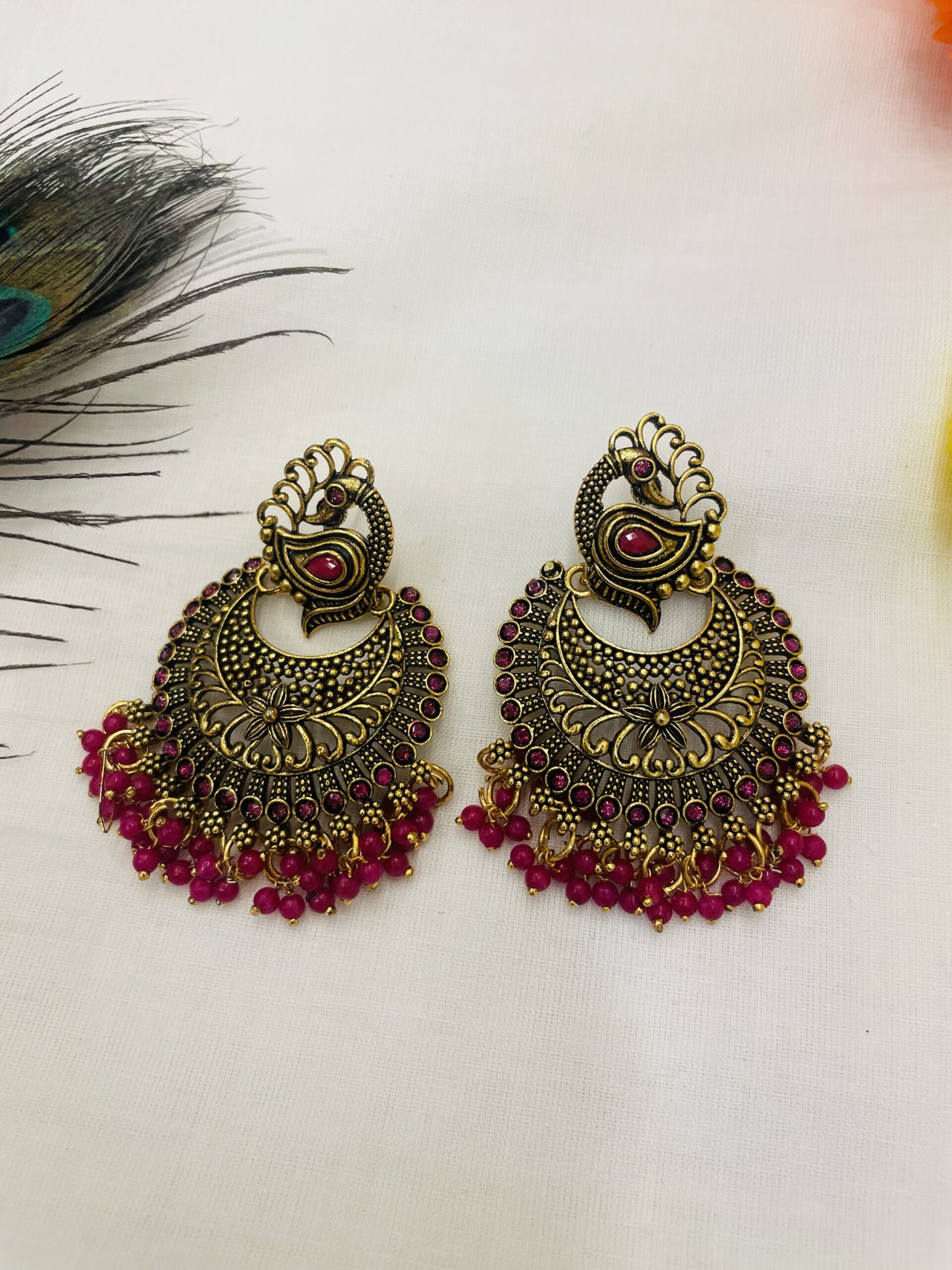 Peacock Pendant with Red small pearls